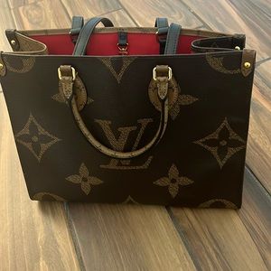 Louis Vuitton on the go. In good condition.